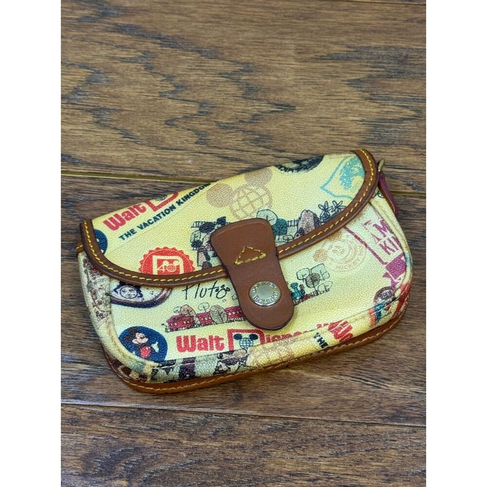 DOONEY AND BOURKE Disney Parks 40th Anniversary Wristlet, 2011